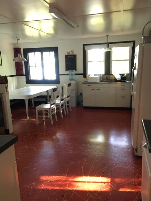 Large kitchen with table seating for 8-10. 