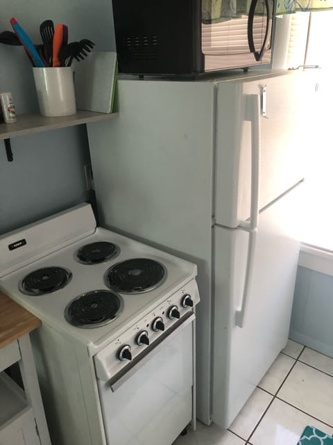4 burner stove and oven w/ large microwave. 