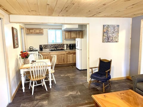 View from entry door towards kitchen/dining area and part of living room