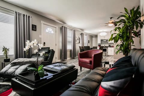 This room has an open floor plan connected to the kitchen. 