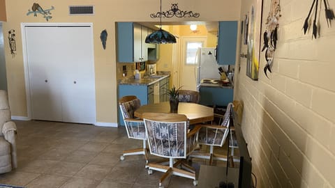 Ceramic floors throughout with area rugs