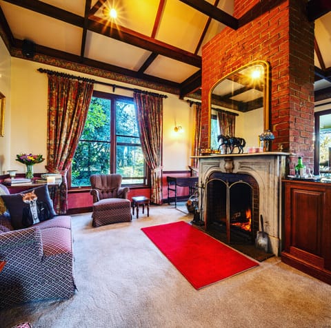 Drinks by the heritage log fireplaces in the drawing room.