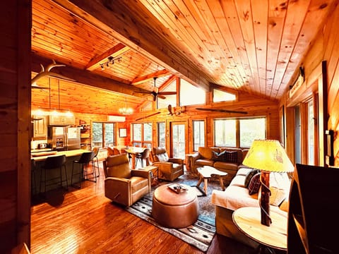 Welcome to our Adirondack cabin. Main living space with plenty of seating. 