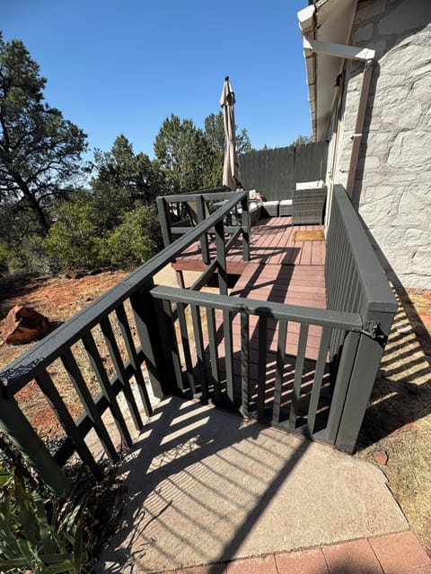 Enclosed private entrance with ramp.