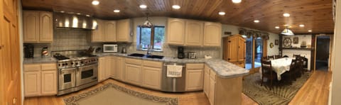 Main House: Kitchen and Dining area leads to deck