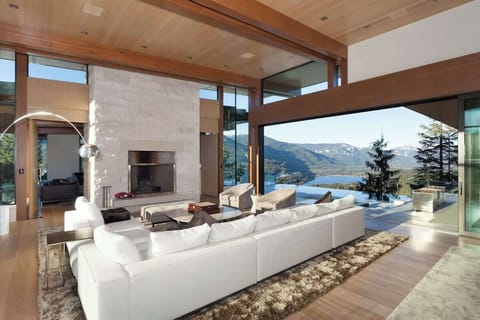 Spacious living room with seamless indoor-outdoor flow and expansive views