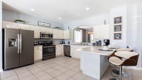 The large chef's kitchen comes equipped with everything you could need