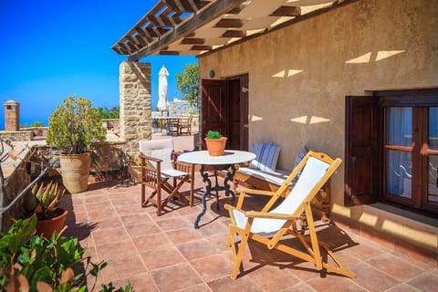 PATIO ON THE TERRACE IN FRONT OF UPPER LEVEL DOUBLE BEDROOM
