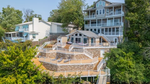 4 story lakehouse with giant multi-level patio and boat dock