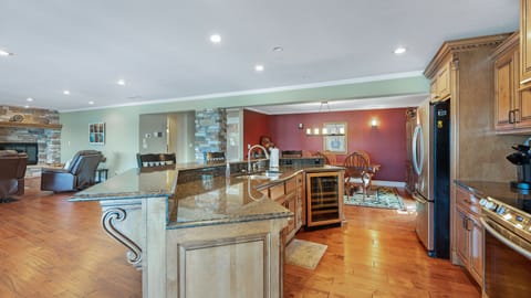 Large open Kitchen with huge granite top island. 