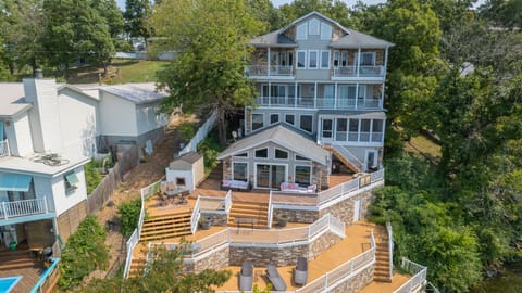 4 story lakehouse with giant multi-level patio and boat dock