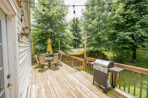 The back deck features a gas grill, an outdoor furniture set and bistro lights!
