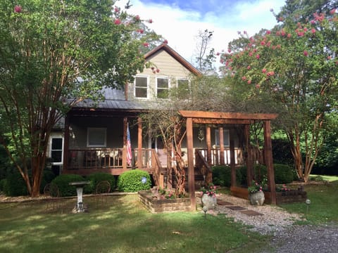 WATER FRONT LAKE PROPERTY. Over 150 feet.  Complete relaxation on 3 porches.