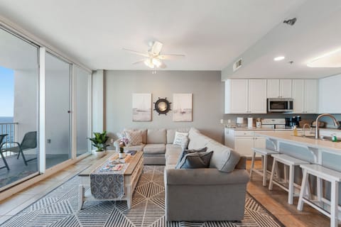 Open Living/Kitchen to a large balcony with a beachfront view