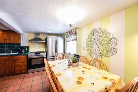 dining area with seating for 6; new stainless steel french door fridge/freezer