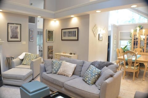 living room view from foyer & kitchen 
