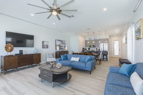 Living area with pool and beach view
