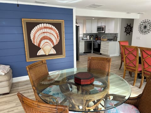 Seating for 10 to eat/play games all easily accessible to kitchen & living areas