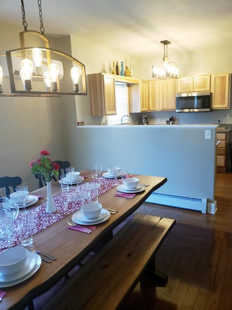 Open concept kitchen, dining, and living areas