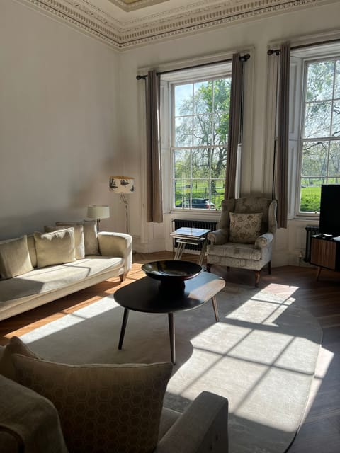 Lounge with windows over looking the park.