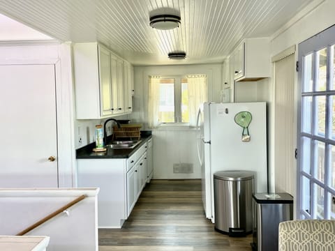Open kitchen flows into main living area.