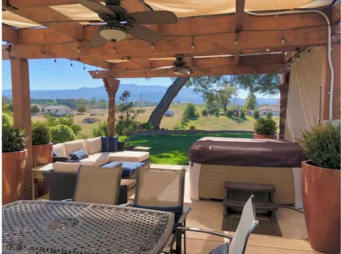 Patio with hot tub and ample seating