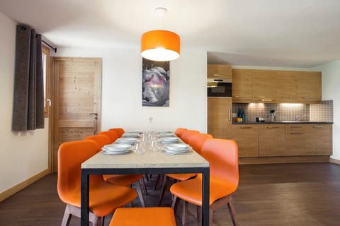 Loads of room at the dining table and the open-concept is always nice for the cook.