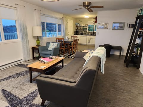 Open floor plan of living, dining, kitchen maximizes the view