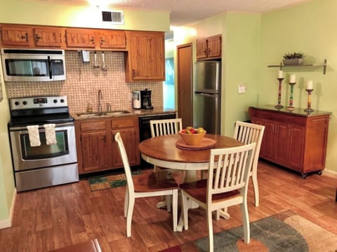Cute!  Full size appliances, nice furnishings and central eating area.