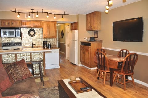 Open style living, dining and kitchen areas.