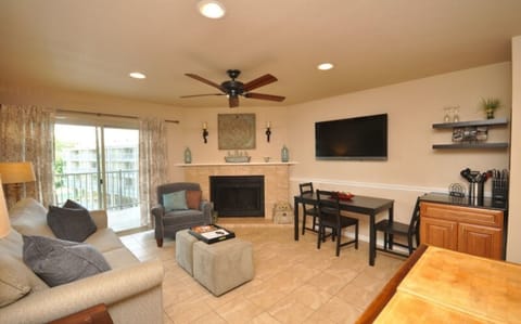 Great living space with table, flat screen TV and a little coffee bar area.