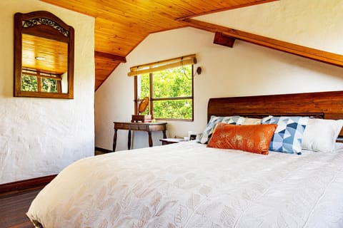 Master bedroom with Queen size bed and bathroom. 