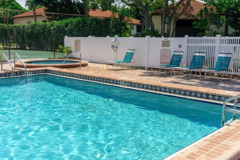 Lounge poolside, then slip into the soothing hot tub