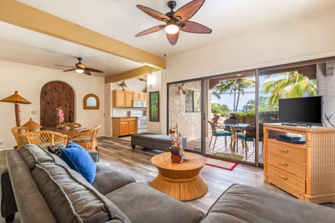 Northern unit living room, kitchen and dining room with ocean view.
