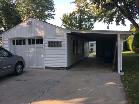Carport and garage entry from road