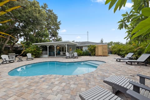 Dive into relaxation in your private heated pool, surrounded by lush Florida native landscape and total privacy.