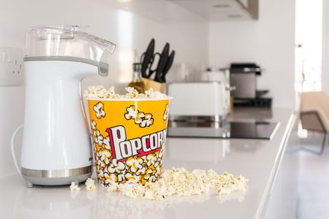 The popcorn machine makes for the best movie night - corn for 3 buckets provided