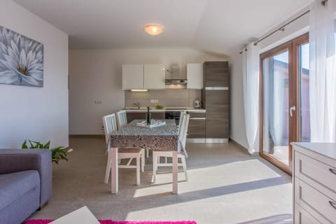 Living area. living + dining area + kitchen