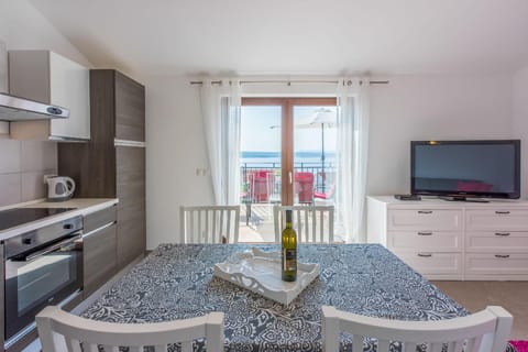 Dining area. kitchen + dining + living area