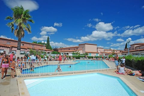 Relax at the outdoor pool during summer.
