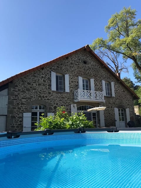 The pool is set right next to the house!