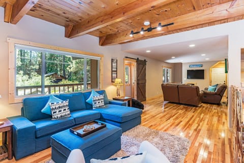 Front of the home offers two sitting areas - around the gas fireplace or TV