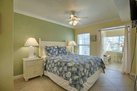 Unwind in a breezy bedroom with soft coastal charm.