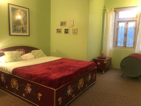 The bedroom.  All the beds are hand painted.