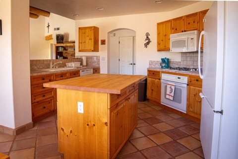 Fully equipped kitchen with Microwave Oven, and Gas stove top