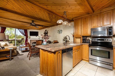 Kitchen overlooks Dining Area and Living room