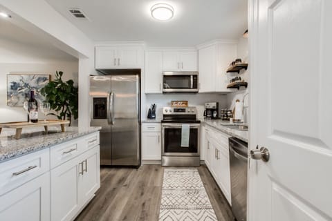 Cook like a chef in our fully stocked kitchen! Equipped with modern appliances, cookware, utensils, and everything you need to prepare delicious meals. Perfect for dining in or entertaining guests!