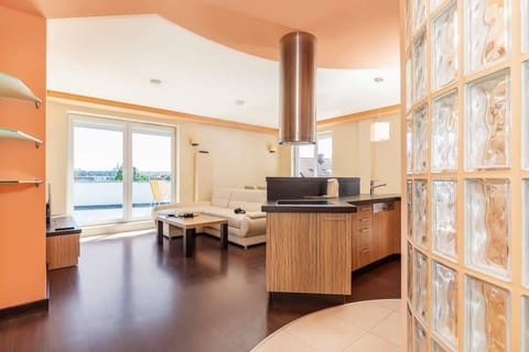 Living room with a comfortable sofa and TV. 