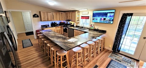 Seats for 22, 
50" 4k Smart TV with wireless keyboard for the fast Internet.
