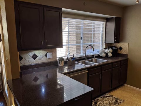 Touch sensor kitchen facet just off the patio